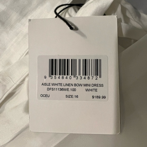 NWT - DISSH AISLE WHITE LINEN BOW MINI DRESS - US WOMEN’S SIZE: 12 - Picture 9 of 9